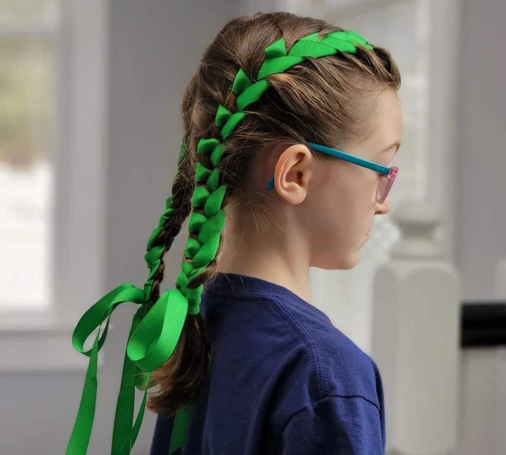 Elegant green ribbons are one of the epic hairdos for St. Patrick’s Day.