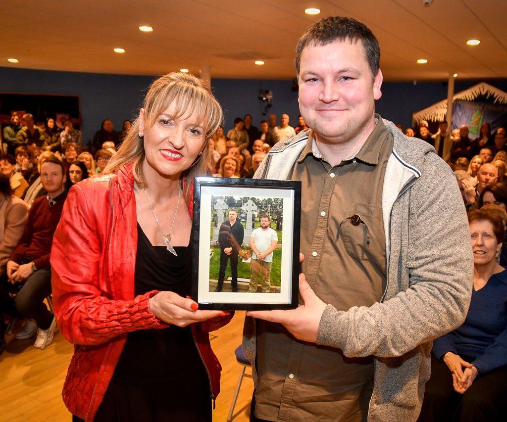 John Connors poses for a photo with Martina Anderson. Connors is known for portraying Patrick Ward. He is one of the members of the Love/Hate cast that you might be wondering, where are they now?