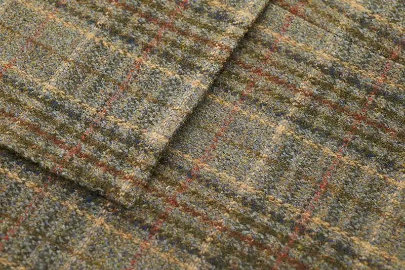 Donegal tweed often features simple yet intricate designs and patterns.