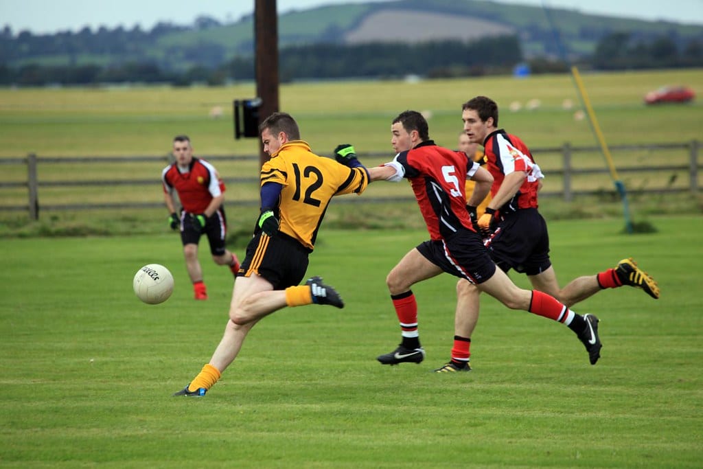 Picture of GAA hurling players in action.