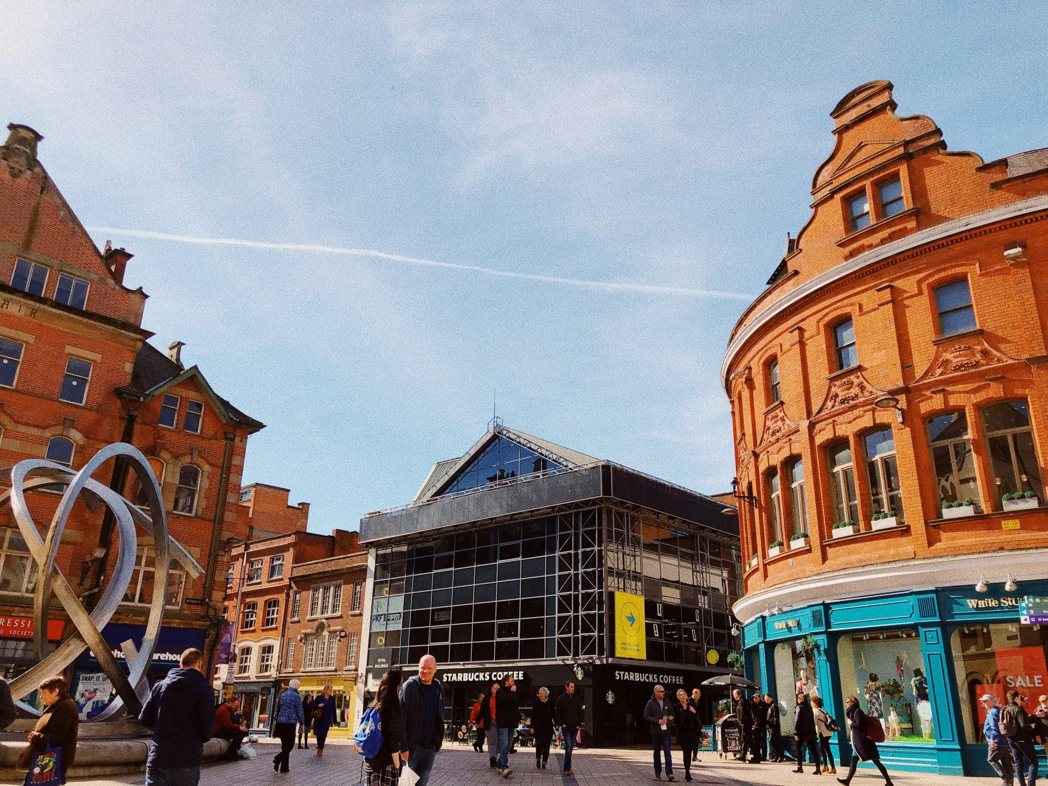 Belfast City Centre shops on a sunny day.